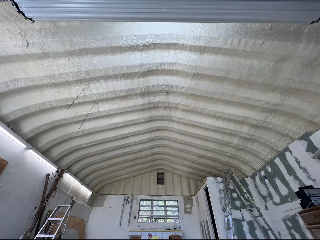 Spray polyurethane foam applied to the underside of a metal roof deck in Fruitridge Pocket